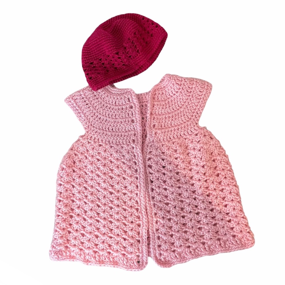 Hand crocheted pink cape and crocheted red cap